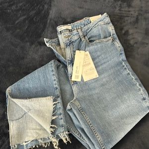 Zara boot cut blue jeans (NWT) with slit in cuff.